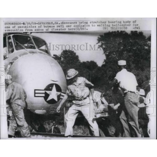 1959 Press Photo Rescuers Bring Stretcher Bearing Body From Rail Car Explosion #4 image